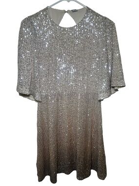 old navy sequin dress A little skirt never hurt anyone Wedding Guest + Holiday Party Outfits from @oldnavy Comment NEW below to shop + swipe to see my favorite looks! I am loving the 95% Polyester 5% Spandex Cold hand wash only Do not bleach Do not soak Do not rub Do not iron Do not dry clean Please note glitter may fall of over time Please refer to swatch image for most accurate colour Sequin dress Old Navy Gray